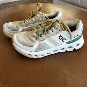 On Running women’s White and Olive Sneakers